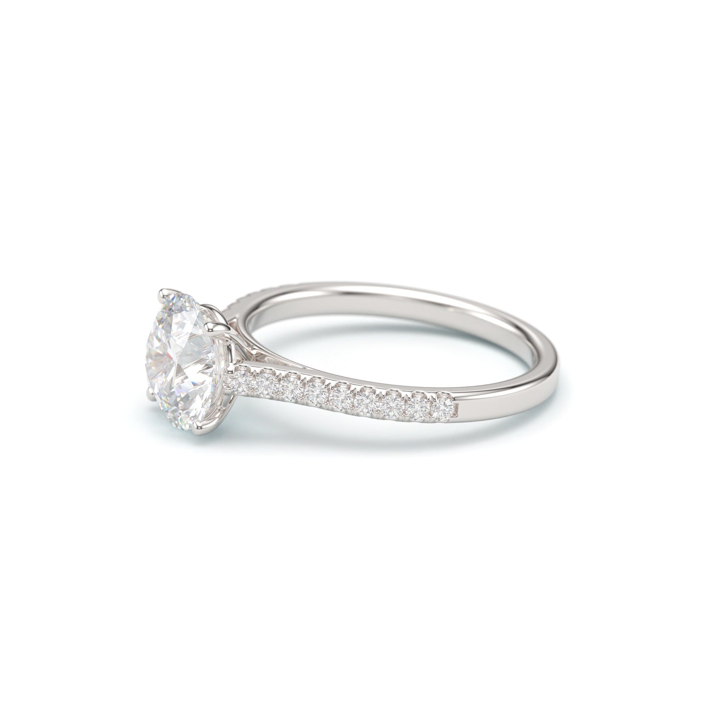 Round Solitaire on a Classic Pave Diamond Band.