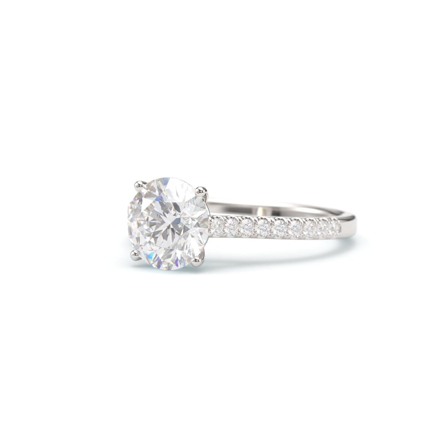 Round Solitaire on a Classic Pave Diamond Band.