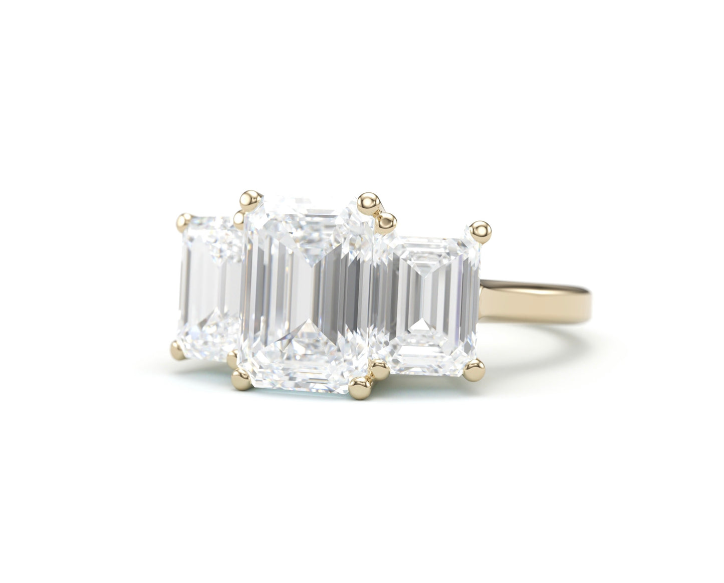 Classic Emerald Three Stone Engagement Ring.