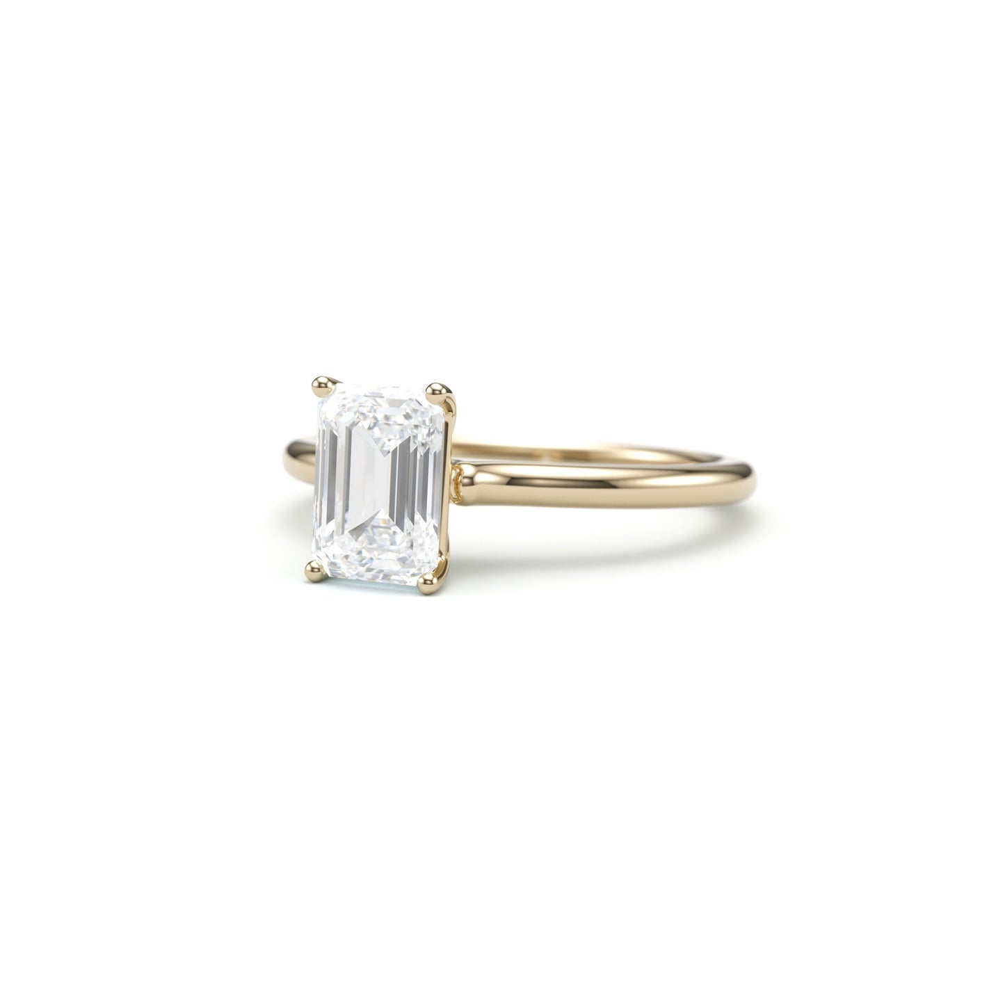 Classic Emerald Solitaire Engagement Ring.