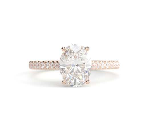 Oval Solitaire on a Classic Pave Diamond Band.