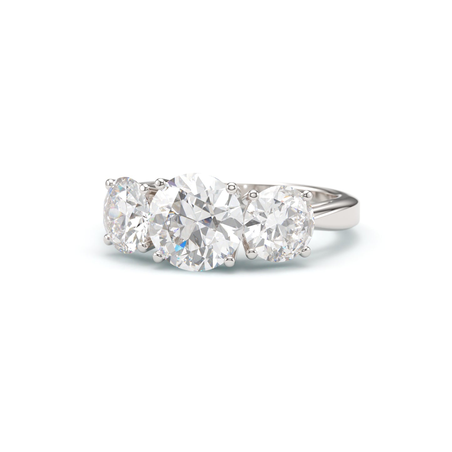 Classic Round Three stone Engagement Ring.