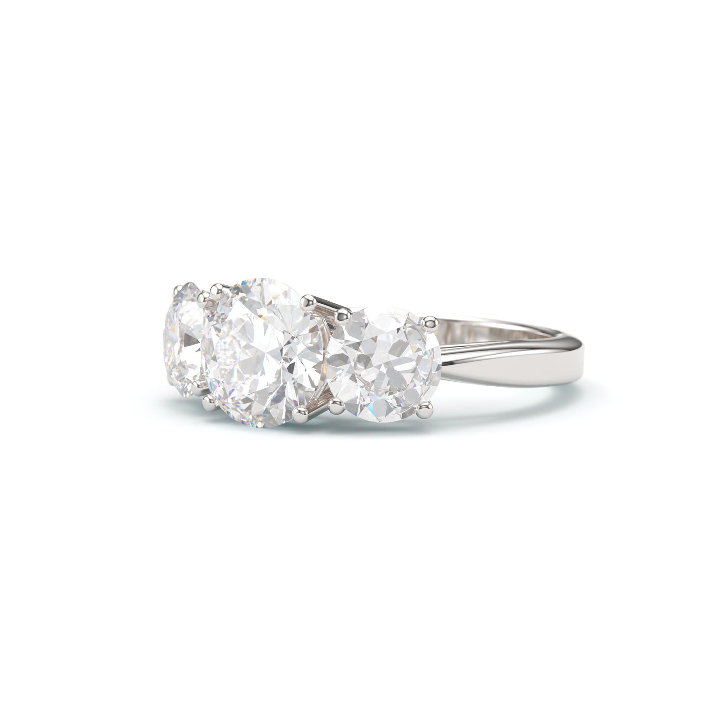 Classic Round Three stone Engagement Ring.