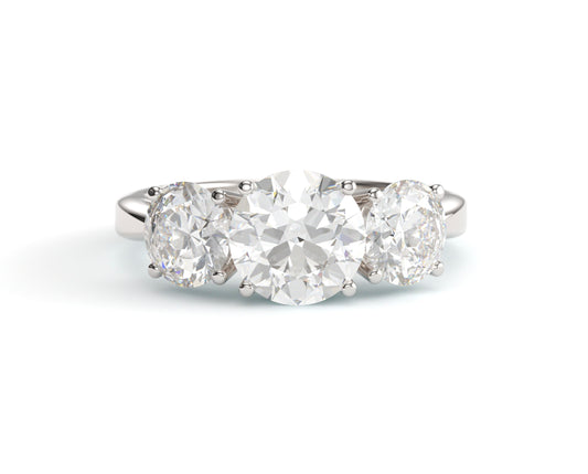 Classic Round Three stone Engagement Ring.