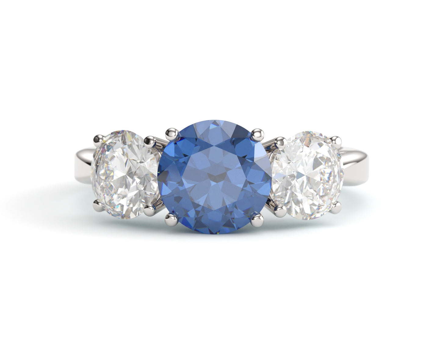 Classic Round Three Stone Sapphire Engagement Ring.